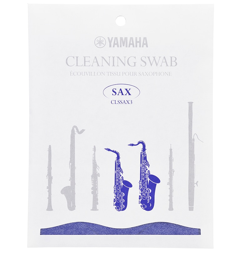 Cleaning swab for saxophone in paper packaging.